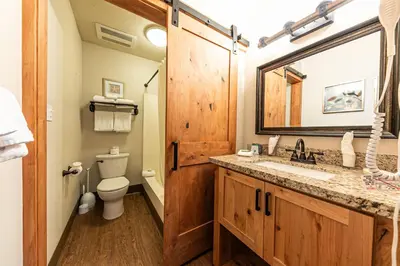 a bathroom with a sink and a toilet at Beautiful Studio w/ Lake View #243 at Donner Lake Village in Truckee