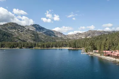 a view of a lake with mountains in the background at King Studio 2nd Floor #234 at Donner Lake Village in Truckee
