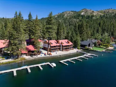 an aerial view of a resort on a lake at Cozy Studio #226 at Donner Lake Village in Truckee