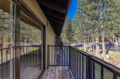 a porch of a house with an open door at Studio w/Kitchen 2nd Floor #213 at Donner Lake Village in Truckee