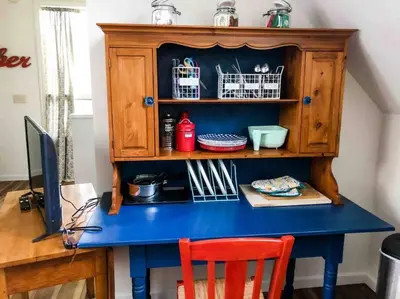 a desk with a blue table and a computer at Twain Harte retreat w/ lake access, ski/Yosemite in Twain Harte