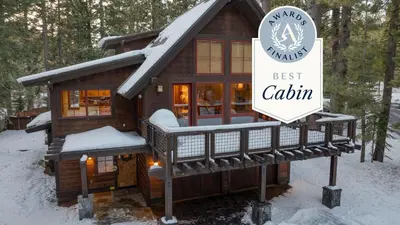 a log cabin in the snow with a sign that reads best cabin at Minutes to Ski Resorts 5min Walk to Lake Sunnyside Ward Creek by AvantStay in Tahoe City