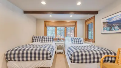 a bedroom with two beds and a window at Minutes to Ski Resorts 5min Walk to Lake Sunnyside Ward Creek by AvantStay in Tahoe City