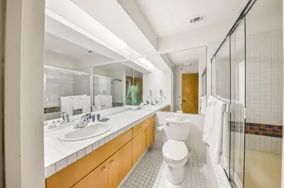 a bathroom with a toilet and a sink at Palisades Tahoe Lodge Rentals Studio Loft #307 in Olympic Valley
