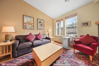 a living room with a couch and two chairs at Palisades Tahoe Lodge Rentals Two Bedroom #813 in Olympic Valley