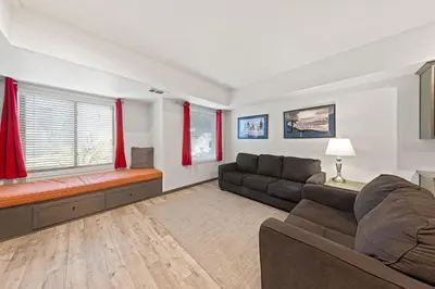 a living room with two couches and a couch at Palisades Tahoe Lodge Rentals Studio #117 in Olympic Valley