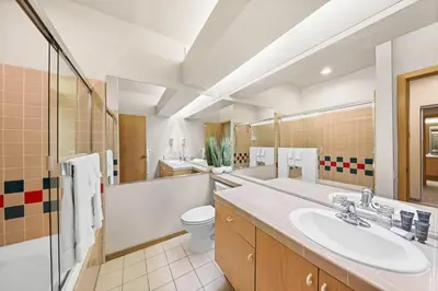 a bathroom with a sink and a toilet at Palisades Tahoe Lodge Rentals Studio #155 in Olympic Valley