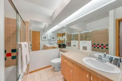 a bathroom with a sink and a toilet at Palisades Tahoe Lodge Rentals Studio #158 in Olympic Valley