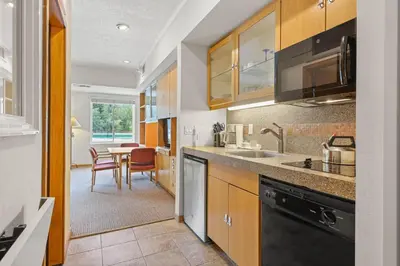 a kitchen with a sink and a counter top at Palisades Tahoe Lodge Rentals Studio #223 in Olympic Valley