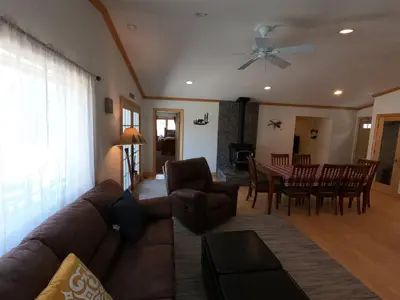 a living room with a couch and a table at Rr-johnson Suite in June Lake