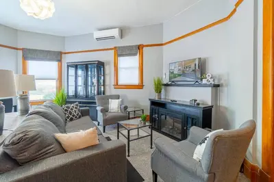a living room with a couch and a fireplace at Rustic 3-Bedroom, 1.5-Bath Oasis by Downtown in Reno