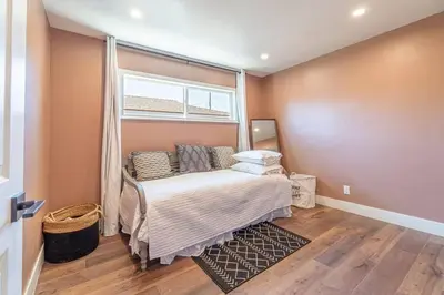 a bedroom with a bed and a window at Reno Serenade: 3-Bed Urban Sanctuary in Reno