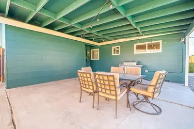 a patio with a table and four chairs at Reno Serenade: 3-Bed Urban Sanctuary in Reno