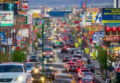 a busy city street filled with lots of cars at Modern Haven: Chic Studio Getaway in Reno