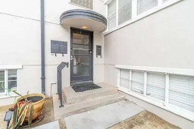 an entrance to a building with a black door at Riverside Glam: Stylish Urban Escape in Reno