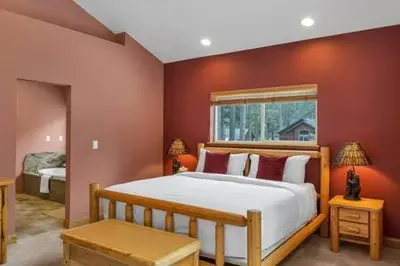 a bedroom with a large bed and a window at Family Friendly 3BD-Next to Beach & Ski Resort in Kings Beach