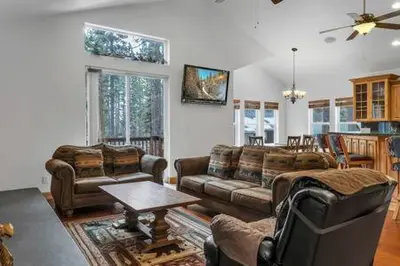 a living room with two couches and a table at Family Friendly 3BD-Next to Beach & Ski Resort in Kings Beach