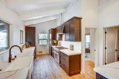a kitchen with a sink and a stove top oven at 6 Mi to Slopes Mtn-View Retreat in Lake Tahoe in South Lake Tahoe