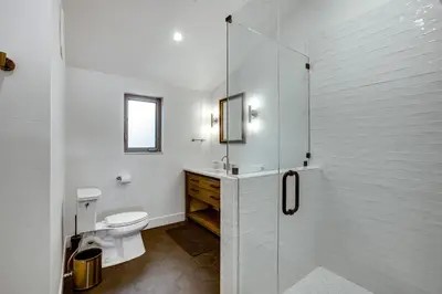 a bathroom with a toilet and a glass shower at 6 Mi to Slopes Mtn-View Retreat in Lake Tahoe in South Lake Tahoe