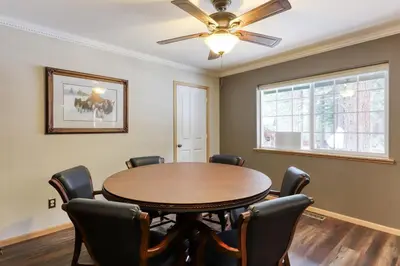 a dining room with a table and chairs at Gentian Family Retreat in South Lake Tahoe