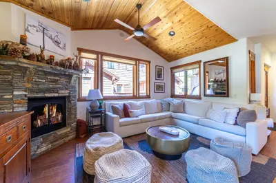 a living room with a couch and a fireplace at Luxury home close to Village; Garage & Jacuzzi in Mammoth Lakes