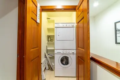 a laundry room with a washer and dryer at Luxury home close to Village; Garage & Jacuzzi in Mammoth Lakes