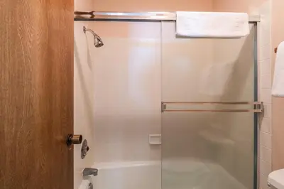 a bathroom with a shower with a glass door at Snowcreek #309 2 Plus Loft, 2 Bathroom Condo Sleeps 8 People with Amazing Mountain Views in Mammoth Lakes