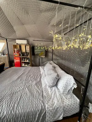 a bedroom with a bed in a room at Mountain view Dome- 10 Minutes to National Park in Dunlap