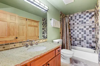 a bathroom with a sink and a toilet at Lavishness at Elevation – Timber Ridge 3 Bedroom condo in Kirkwood