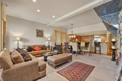 a living room with a couch and a table at Lavishness at Elevation – Timber Ridge 3 Bedroom condo in Kirkwood