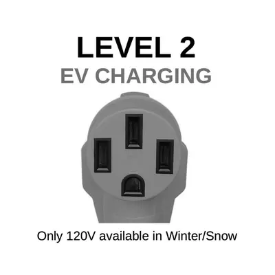 a sign that reads level ev charging only ay available in winter at Sweet Retreat: Theater, Pool/Ping-Pong, Quiet! in Camp Connell