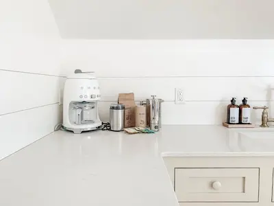 a kitchen counter with a coffee maker on it at Homestead Barn Loft in Sonora