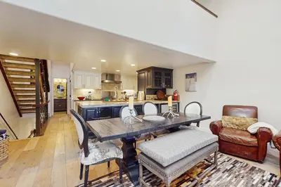 a kitchen with a table and chairs in a room at High Sierra Haven in Incline Village