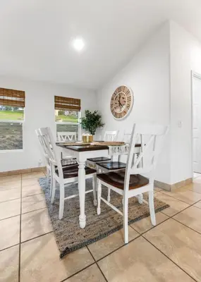 a white dining room with a white table and chairs at 4 Miles to Sequoia NTL Park in Three Rivers