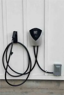 a solar charger and a box on the side of a house at Soleil Luna 2 miles from Sequoia Park Entrance in Three Rivers