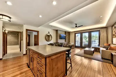a living room with a large island in the middle at Zalanta 220 - Heavenly Wow-Pool View in Stateline