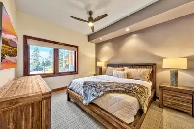 a bedroom with a bed and a window at Zalanta 222 – Luxe Stay by Gondola Lake in Stateline