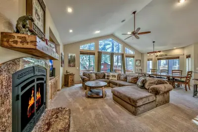 a living room with a couch and a fireplace at Cubby Bear at Heavenly Tahoe - Pets in South Lake Tahoe