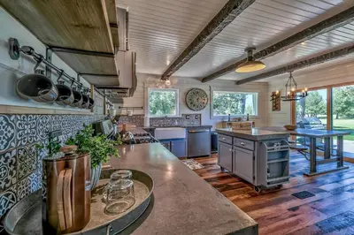 a large kitchen with a counter and a counter top at Duckhook at Tahoe in South Lake Tahoe