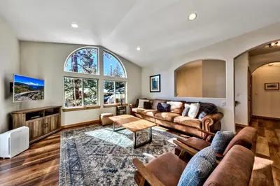 a living room with a couch and a table at Heavenly Retreat in South Lake Tahoe