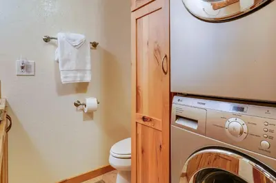 a laundry room with a washer and dryer at Northstar Resort Condo with Hot Tub, Shuttle Access! in Truckee
