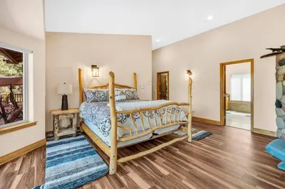 a bedroom with a bed in a room at 1603 Bel Aire Circle home in South Lake Tahoe
