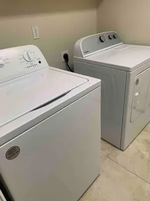 a white washer and dryer in a room at Sweet Holiday in Antelope