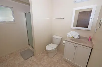 a bathroom with a toilet and a sink and a shower at 1629 Pioneer Trail home in South Lake Tahoe