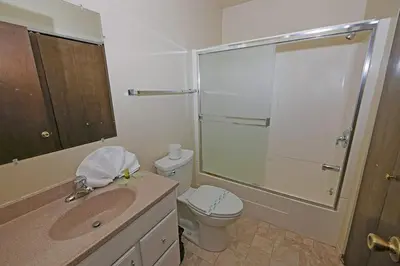 a bathroom with a sink and a toilet and a shower at 1629 Pioneer Trail home in South Lake Tahoe
