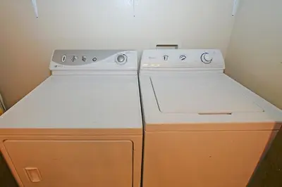 a kitchen with a stove and a refrigerator at 1629 Pioneer Trail home in South Lake Tahoe