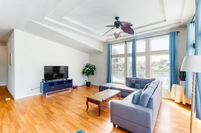 a living room with a couch and a tv at Zerenity Lookout East in Oakhurst