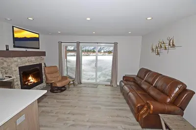 a living room with a couch and a fireplace at 405 Ala Wai Blvd, 180 condo in South Lake Tahoe