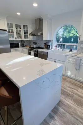 a kitchen with white cabinets and a white counter top at Serene Modern Family Getaway Near Midtown Downtown and Folsom Lake in Elk Grove