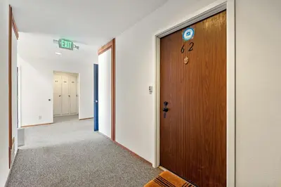 a corridor of an office with a wooden door at Private/Cozy Kings Beach Retreat in Tahoe Vista